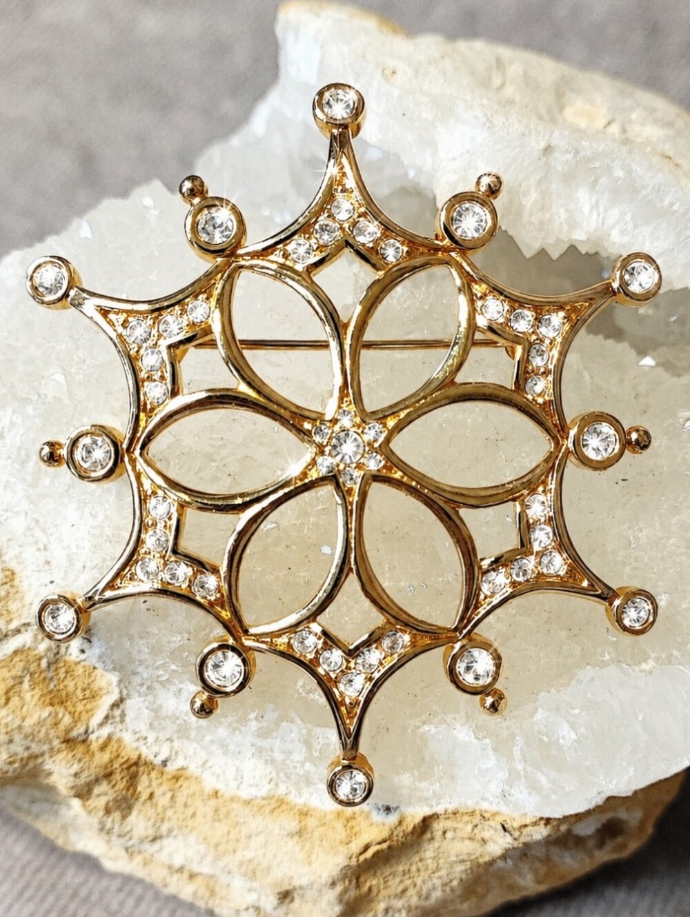 Swarovski Clear Crystal Bezel Set Swan Signature Gold Tone Snowflake Brooch Pin